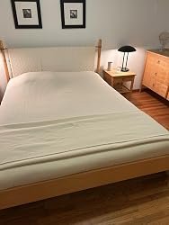 Pendleton Eco-Wise washable wool blanket spread on a bed