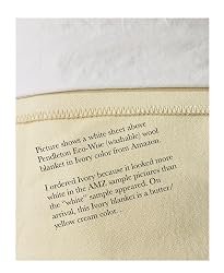 Pendleton Eco-Wise product care tag showing 100% virgin wool and machine wash care
